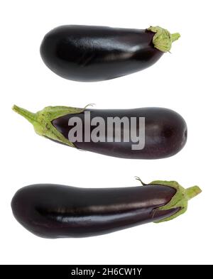 fresh eggplants isolated on white background, closeup of three whole aubergines, top view Stock Photo