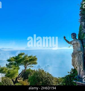 Statue And Gardens On Capri Island Reflex Stock Photo - Download
