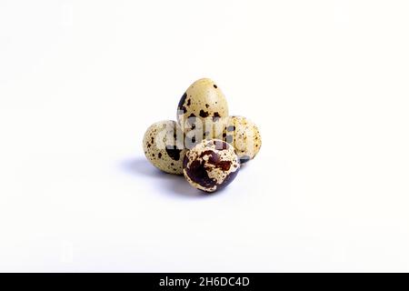 isolate, a bunch of quail eggs on a white background, close-up Stock Photo