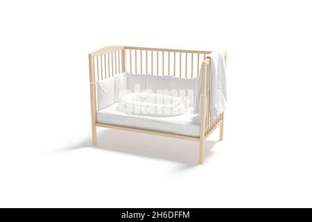 Blank wood cot with white crib sheet and nest mockup, 3d rendering. Empty protection bed with mattress and sleeping pad mock up, isolated. Clear woode Stock Photo