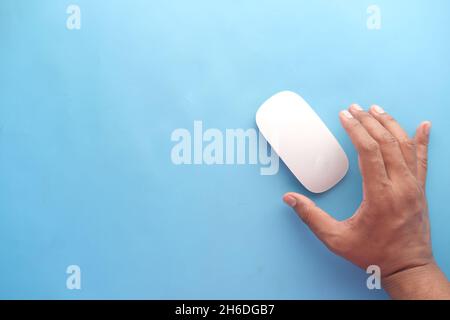 Businessman hand with computer mouse, Close up Stock Photo