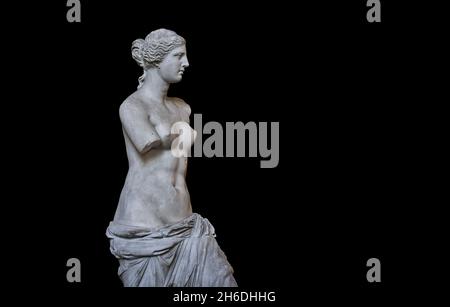 Venus de Milo ancient Greek statue of Aphrodite, circa 150 and 125 BC, Louvre Museum Ma399 or N527. Aphrodite is depicted hair in a bun with a headban Stock Photo
