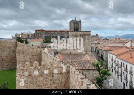 AVILA, SPAIN – JUNE 20, 2021: Walls of Avila, Spain, with the Cathedral at the back. This site is a National Monument, and the old city was declared a Stock Photo