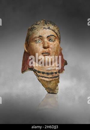 Roman Egyptian plaster funerary Mask, 100 - 150 AD, Cheikh Ibada, Antinopolis. Louvre Museum AF6704. Mummy portrait of a girl. The polychrome is parti Stock Photo