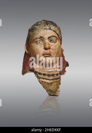 Roman Egyptian plaster funerary Mask, 100 - 150 AD, Cheikh Ibada, Antinopolis. Louvre Museum AF6704. Mummy portrait of a girl. The polychrome is parti Stock Photo