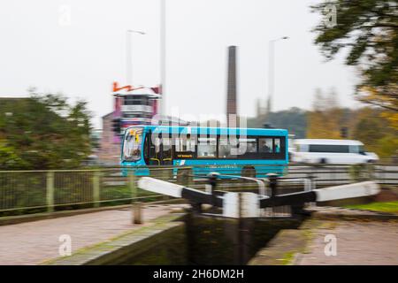 Speeding bus with background motion blur Stock Photo