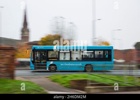 Speeding bus with background motion blur Stock Photo