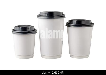Three different sizes of white takeaway paper cups with black plastic lids isolated on white background. Stock Photo