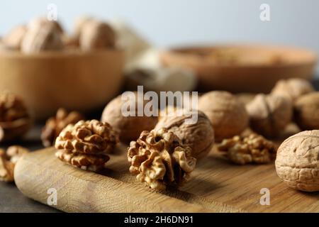 Concept of healthy food with walnuts on wooden table Stock Photo
