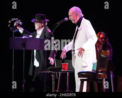 November 14, 2021, Los Angeles, California, USA: MICHAEL NESMITH and MICKY DOLENZ on stage together for the last time as they wrapped up the Monkees 2021 Farewell Tour at the Greek Theater, Los Angeles, CA, USA. The farewell tour will mark the end of a unique project that began in 1965 when four young men were cast in a television show about a struggling rock band that was inspired by the Beatles 'A Hard Day's Night.'Formed in Los Angeles for the eponymous television series, the quartet of Dolenz, Nesmith, the late Peter Tork and the late Davy Jones brought a singular mix of pop, rock, psyched Stock Photo