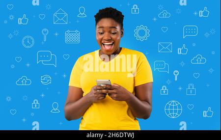 Black Woman Using Smartphone Over Blue Background With Diverse User Interface Icons Stock Photo