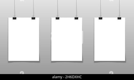 Set of 3 blank posters hanging on thread with clips Stock Vector