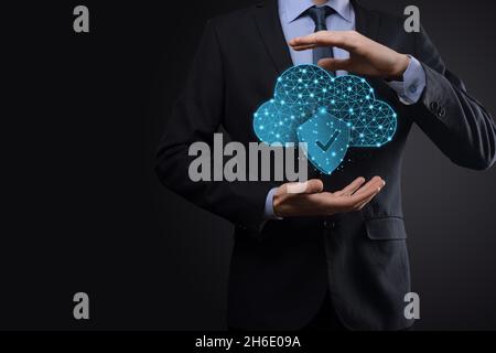 Cloud technology. Polygonal wireframe cloud storage sign with shield with a tick on dark blue. Cloud computing, big data center, future infrastructure Stock Photo
