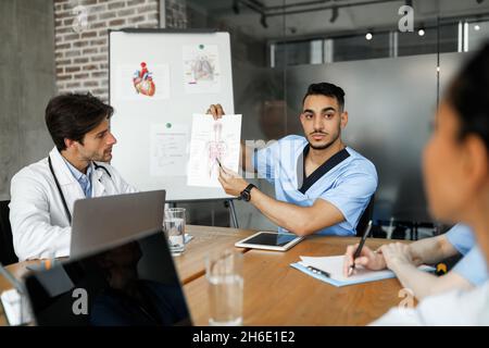 Middle eastern man doctor having speech while medical conference Stock Photo