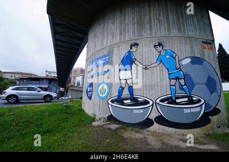 Graffiti on a railway pillar showing an Italy player shaking hands with a San Marino during the FIFA World Cup Qualifying match at the San Marino Stadium, Serravalle. Picture date: Monday November 15, 2021. Stock Photo