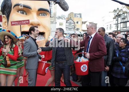 Gary Lineker stars alongside Al Murray the pub landlord and Jimmy Carr in the latest Walkers ad for Comic Relief shot in Kingston - in a bid to raise over Â£1million this Red Nose Day with their very own Walkers crisps! The ad will air on 16th February. Stock Photo