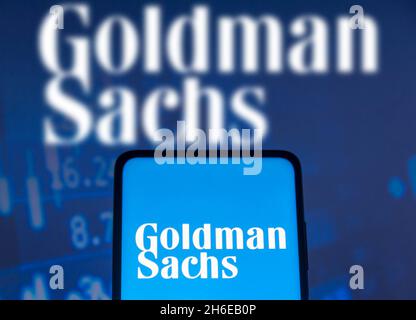 In this photo illustration a Goldman Sachs Group logo seen displayed on a smartphone screen and in the background. (Photo by Rafael Henrique / SOPA Images/Sipa USA) Stock Photo