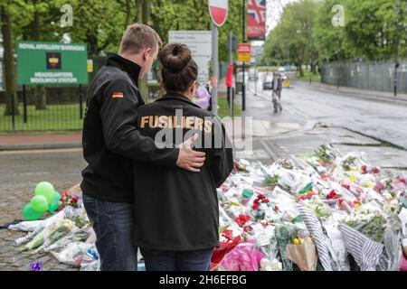 Flowers and tributes are left outside the Royal Artillery Barracks in Woolwich, Southeast London for Drummer Lee Rigby was murdered in a terror attack.  Stock Photo