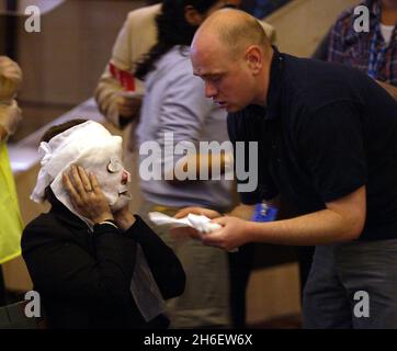 A series of bomb attacks on central London's Transport system killed more than 50 people and injured about over 700 others on 07/07/05. Picture shows : An injured woman at Edgware Road tube station. Jeff Moore/allactiondigital.com              Stock Photo