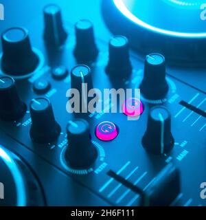 Deejay mixing desk turntables party nightclub disco lights square album cover design. Stock Photo