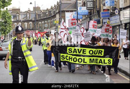 Council leader Clyde Loakes took at dramatic u turn last night and backed down on proposals to scrap school dinners in Waltham Forest after almost 400 protesting school children, parents and dinner ladies refused to moved from the steps of the local chambers in Walthamstow banging pots and pans until he agreed to talk to them. Celebrity chef Jamie Oliver gave his backing to the campaign.  Stock Photo