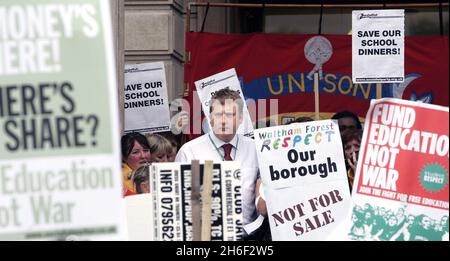 Council leader Clyde Loakes took at dramatic u turn last night and backed down on proposals to scrap school dinners in Waltham Forest after almost 400 protesting school children, parents and dinner ladies refused to moved from the steps of the local chambers in Walthamstow banging pots and pans until he agreed to talk to them. Celebrity chef Jamie Oliver gave his backing to the campaign.  Stock Photo