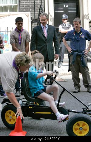 Scouts from around the country, including Chief Scout Peter Duncan, joined PM Tony Blair in Downing Street this afternoon to celebrate their centenary. Stock Photo