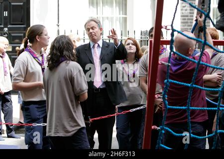 Scouts from around the country, including Chief Scout Peter Duncan, joined PM Tony Blair in Downing Street this afternoon to celebrate their centenary. Stock Photo