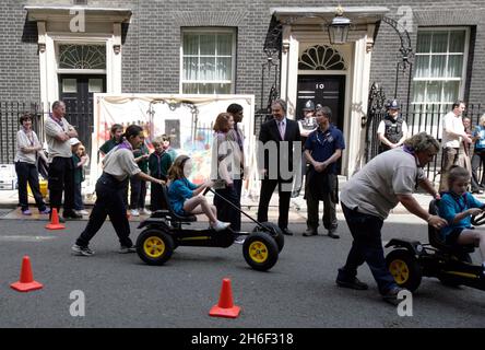 Scouts from around the country, including Chief Scout Peter Duncan, joined PM Tony Blair in Downing Street this afternoon to celebrate their centenary. Stock Photo