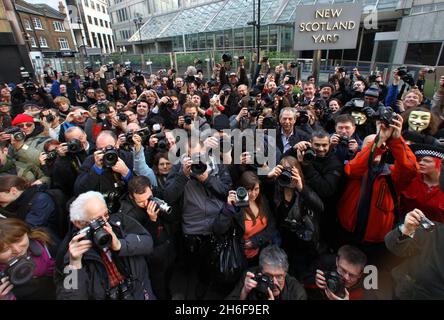 Hundreds of photographers protested outside New Scotland Yard as a new ant-terror law was brought in which specifically targets photographers and people taking pictures of Police and Armed forces in public places. Stock Photo