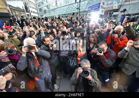 Hundreds of photographers protested outside New Scotland Yard as a new ant-terror law was brought in which specifically targets photographers and people taking pictures of Police and Armed forces in public places. Stock Photo