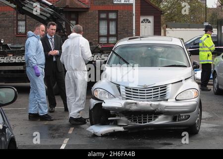 Investigations get underway at the scene close to the Olympic site in Stratford, East London, where a police officer sustanined serious head injuries following an incident involving burglary suspects Stock Photo