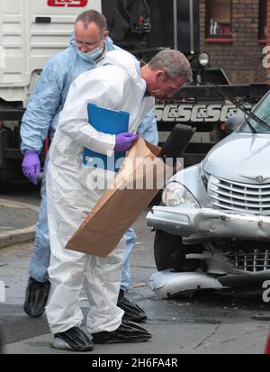 Investigations get underway at the scene close to the Olympic site in Stratford, East London, where a police officer sustanined serious head injuries following an incident involving burglary suspects Stock Photo