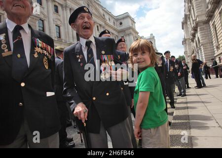 94 year old veteran Norman Lythgoe with his 5 year old Grandson Oscar Stock Photo