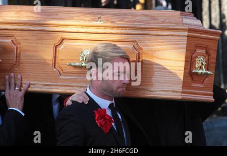 Band members including Ronan Keating carry the coffin of Stephen Gately from the Church of St Laurence O'Toole in Dublin after the funeral of the Boyzone singer who died of natural cause last weekend aged 33. Stock Photo