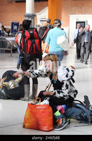 Festival goers head to Bestival 2010 on the Isle Of Wight from Victoria Station this morning. Bestival 2010 takes place between Thursday 9th and Sunday 12th September 2010 at Robin Hill Countyside Adventure Park near Newport on the Isle of Wight. Stock Photo