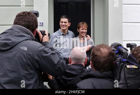 David Miliband poses with his wife Louise Shackleton outside their North London home this afternoon. The shadow foreign secretary will decide his future in UK politics later today after being narrowly beaten by his brother Ed for the Labour leadership Stock Photo