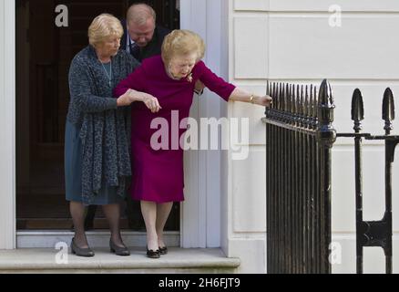 Baroness Margaret Thatcher pictured outside her London home this afternoon after leaving hospital. The Former prime minister spent almost two weeks at the Cromwell hospital after being admitted with the flu. Stock Photo