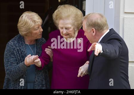 Baroness Margaret Thatcher pictured outside her London home this afternoon after leaving hospital. The Former prime minister spent almost two weeks at the Cromwell hospital after being admitted with the flu. Stock Photo