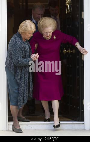 Baroness Margaret Thatcher pictured outside her London home this afternoon after leaving hospital. The Former prime minister spent almost two weeks at the Cromwell hospital after being admitted with the flu. Stock Photo