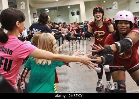 The London Rollergirls: an all-female, roller skate derby league held at  Brompton Hall in Earl's