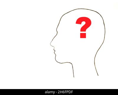 Head silhouette with red question mark instead of the brain Stock Photo
