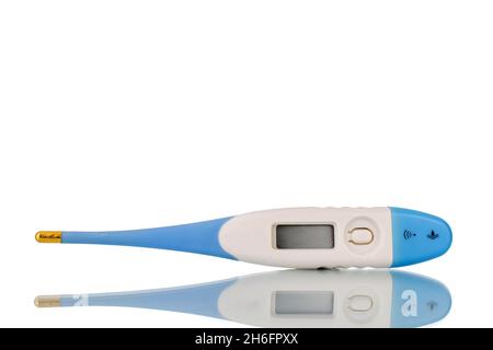 One thermometer, close-up, isolated on white. Stock Photo