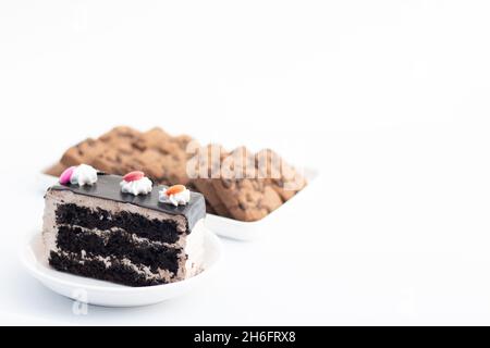 Designer Dark Chocolate Marble Pastry German Truffle With Whipped Cream Decoration On Top Served In Plate And Cookies In Blur. White Background Stock Photo