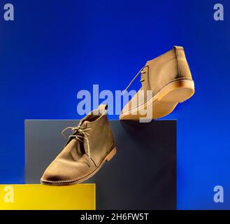 leather shoes shot on the catwalk in backlight Stock Photo