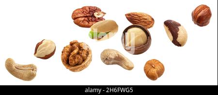 Flying nuts isolated on white background Stock Photo