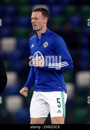 Northern Ireland's Jonny Evans warms up on the pitch before the FIFA World Cup Qualifying match at Windsor Park, Belfast. Picture date: Monday November 15, 2021. Stock Photo