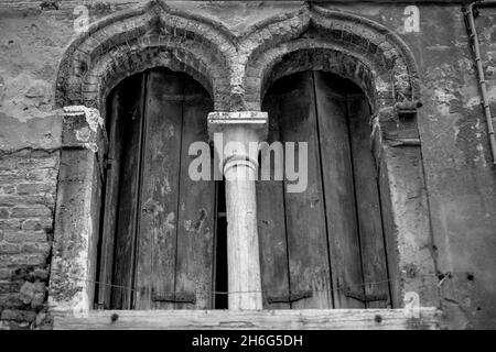 Window frame separated by a column Stock Photo