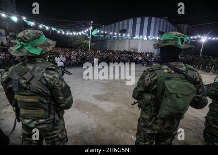 Members of Martyr Izz al-Din al-Qassam Brigades take part in a memorial service for al-Qassam member Raed al-Rantisi, in Gaza Strip, on Nov 15, 2021. Stock Photo