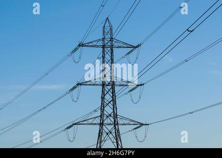 Electricity pylon with blue sky Stock Photo